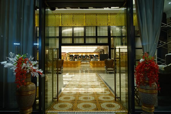 Grand double-door entrance portal into main hall